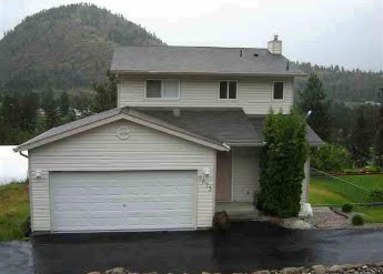 Two-storey home with attached garage in Kelowna
